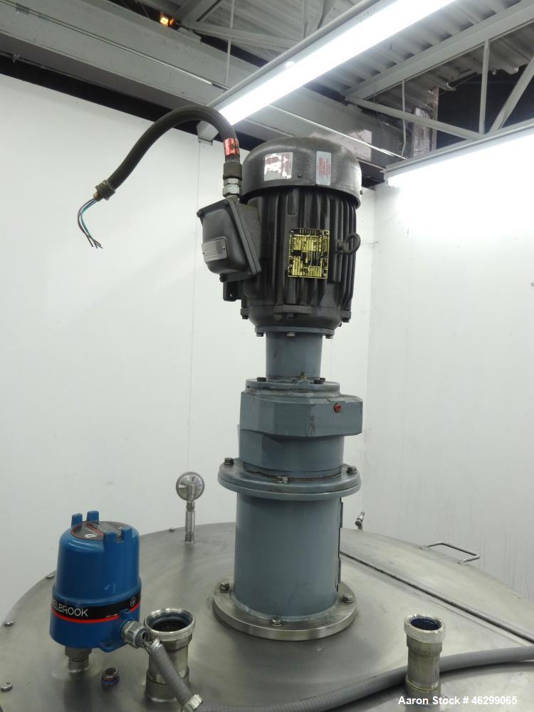 Used Tank, Approximately 120 Gallons, 304 Stainless Steel, Vertical. 40" Diameter x 22" straight side. Bolt-on flat top with 1/4 hinged cover, dished bottom. Top entering agitator, with 2" diameter s...