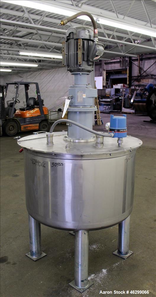 Used Tank, Approximately 120 Gallons, 304 Stainless Steel, Vertical. 40" Diameter x 22" straight side. Bolt-on flat top with 1/4 hinged cover, dished bottom. Top entering agitator, with 2" diameter s...