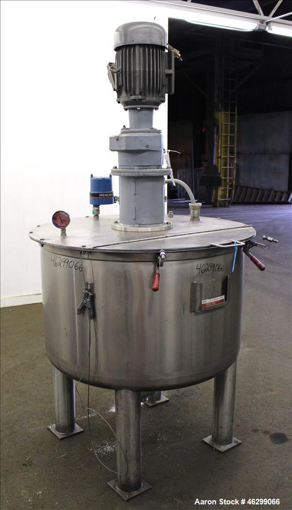Used Tank, Approximately 120 Gallons, 304 Stainless Steel, Vertical. 40" Diameter x 22" straight side. Bolt-on flat top with 1/4 hinged cover, dished bottom. Top entering agitator, with 2" diameter s...