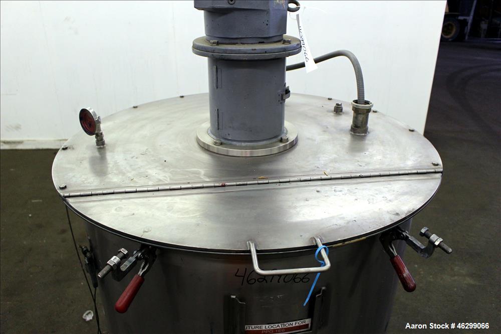 Used Tank, Approximately 120 Gallons, 304 Stainless Steel, Vertical. 40" Diameter x 22" straight side. Bolt-on flat top with 1/4 hinged cover, dished bottom. Top entering agitator, with 2" diameter s...