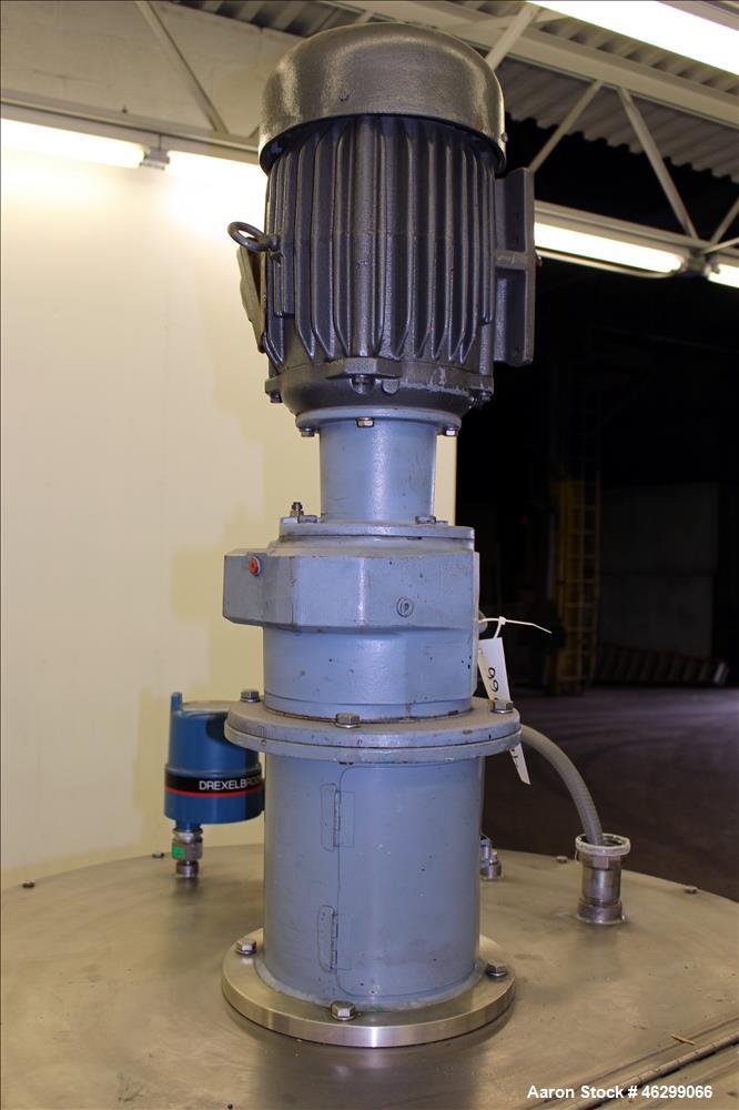 Used Tank, Approximately 120 Gallons, 304 Stainless Steel, Vertical. 40" Diameter x 22" straight side. Bolt-on flat top with 1/4 hinged cover, dished bottom. Top entering agitator, with 2" diameter s...