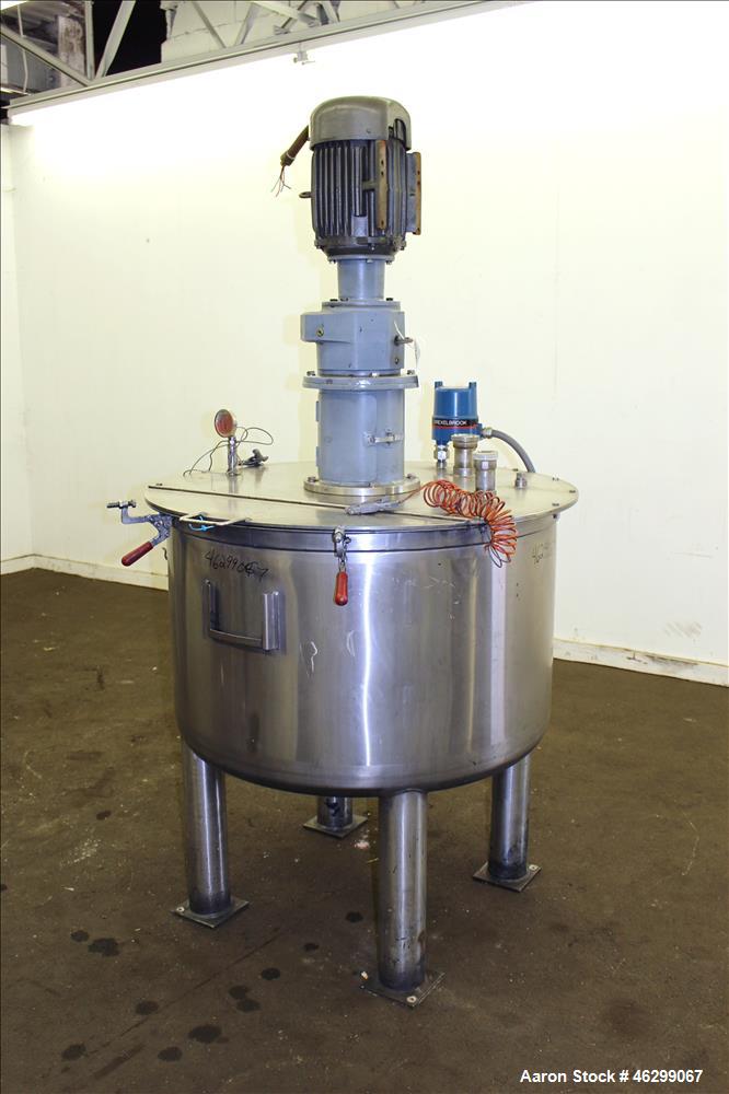 Used Tank, Approximately 120 Gallons, 304 Stainless Steel, Vertical. 40" Diameter x 22" straight side. Bolt-on flat top with 1/4 hinged cover, dished bottom. Top entering agitator, with 2" diameter s...