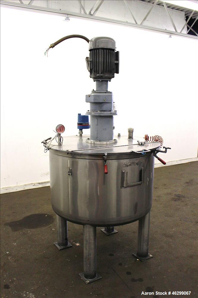 Used Tank, Approximately 120 Gallons, 304 Stainless Steel, Vertical. 40" Diameter x 22" straight side. Bolt-on flat top with 1/4 hinged cover, dished bottom. Top entering agitator, with 2" diameter s...