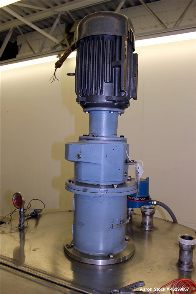 Used Tank, Approximately 120 Gallons, 304 Stainless Steel, Vertical. 40" Diameter x 22" straight side. Bolt-on flat top with 1/4 hinged cover, dished bottom. Top entering agitator, with 2" diameter s...