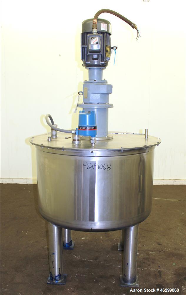 Used Tank, Approximately 120 Gallons, 304 Stainless Steel, Vertical. 40" Diameter x 22" straight side. Bolt-on flat top with 1/4 hinged cover, dished bottom. Top entering agitator, with 2" diameter s...