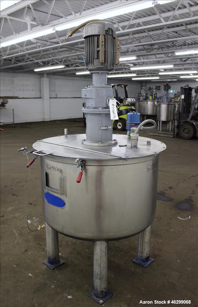 Used Tank, Approximately 120 Gallons, 304 Stainless Steel, Vertical. 40" Diameter x 22" straight side. Bolt-on flat top with 1/4 hinged cover, dished bottom. Top entering agitator, with 2" diameter s...