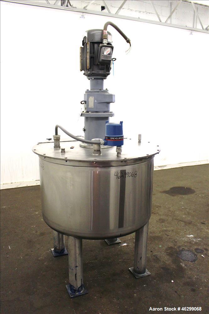 Used Tank, Approximately 120 Gallons, 304 Stainless Steel, Vertical. 40" Diameter x 22" straight side. Bolt-on flat top with 1/4 hinged cover, dished bottom. Top entering agitator, with 2" diameter s...