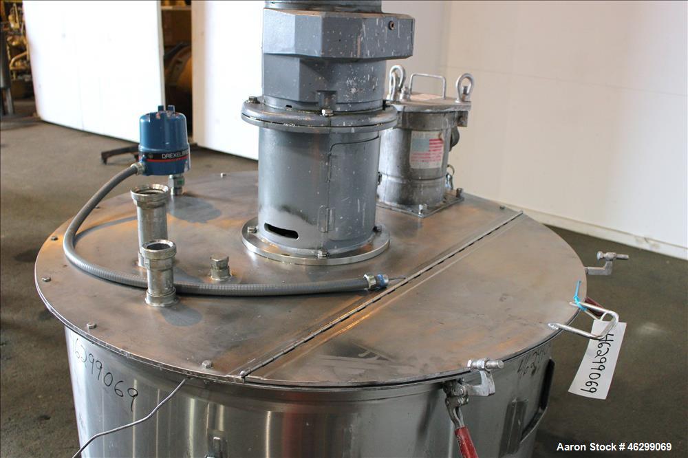 Used Tank, Approximately 200 Gallons, 304 Stainless Steel, Vertical. 46" Diameter x 25" straight side. Bolt-on flat top with 1/4 hinged cover, dished bottom. Top entering agitator, with 2-1/2" diamet...