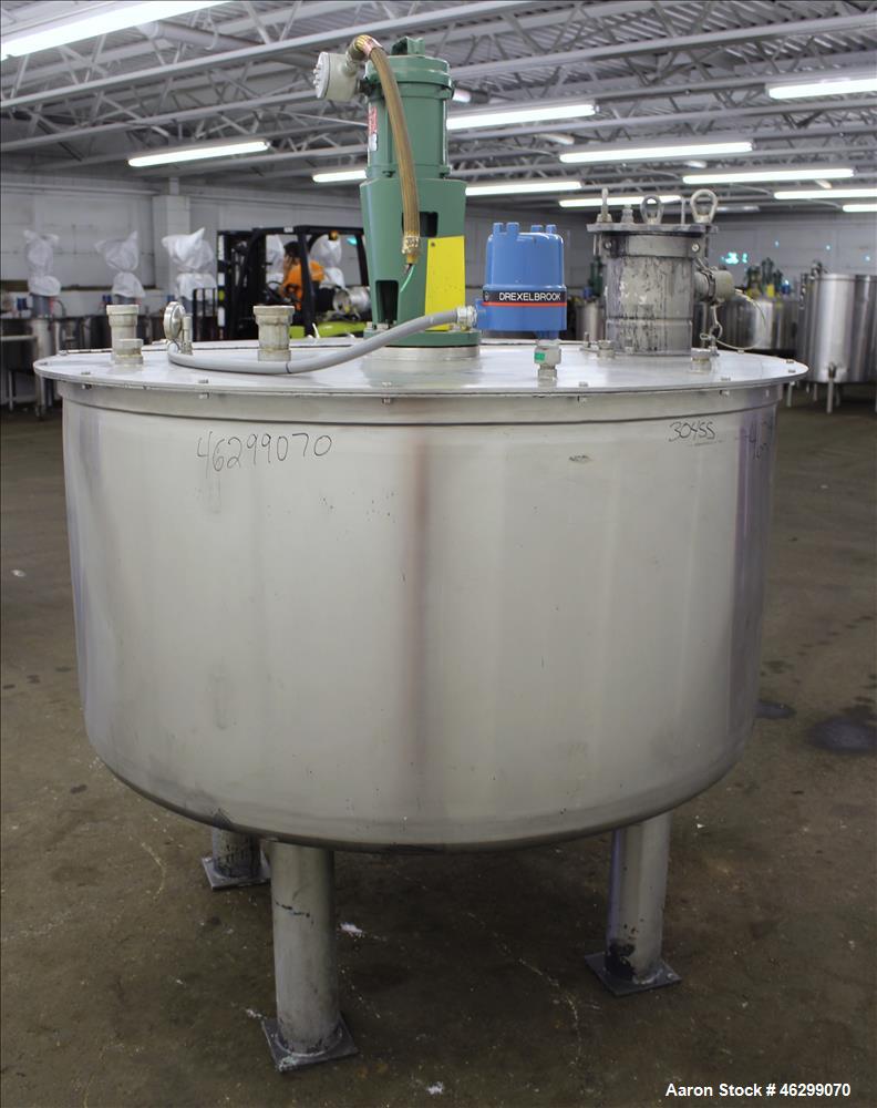 Used Tank, Approximately 350 Gallons, 304 Stainless Steel, Vertical. 60" Diameter x 28" straight side. Bolt-on flat top with 1/3 hinged cover, dished bottom. Top entering Lightnin agitator, model XJC...