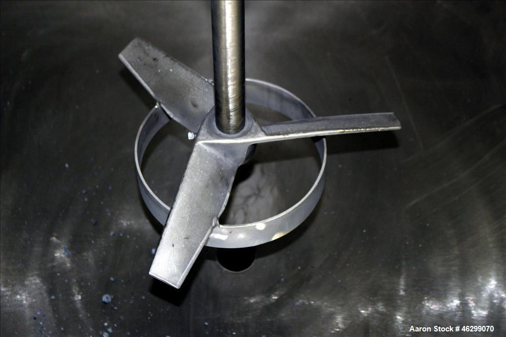 Used Tank, Approximately 350 Gallons, 304 Stainless Steel, Vertical. 60" Diameter x 28" straight side. Bolt-on flat top with 1/3 hinged cover, dished bottom. Top entering Lightnin agitator, model XJC...