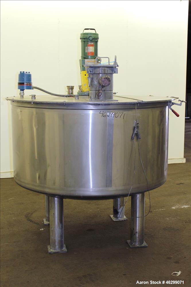 Used Tank, Approximately 350 Gallons, 304 Stainless Steel, Vertical. 60" Diameter x 28" straight side. Bolt-on flat top with 1/3 hinged cover, dished bottom. Top entering Lightnin agitator, model XJC...