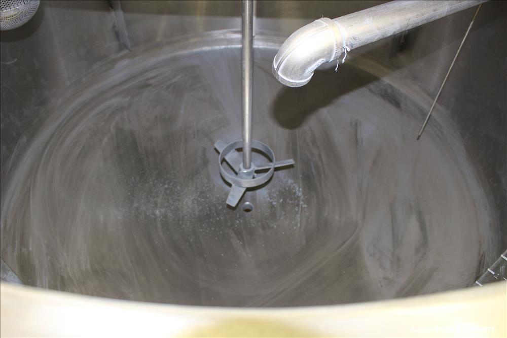 Used Tank, Approximately 350 Gallons, 304 Stainless Steel, Vertical. 60" Diameter x 28" straight side. Bolt-on flat top with 1/3 hinged cover, dished bottom. Top entering Lightnin agitator, model XJC...