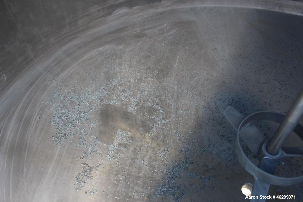 Used Tank, Approximately 350 Gallons, 304 Stainless Steel, Vertical. 60" Diameter x 28" straight side. Bolt-on flat top with 1/3 hinged cover, dished bottom. Top entering Lightnin agitator, model XJC...