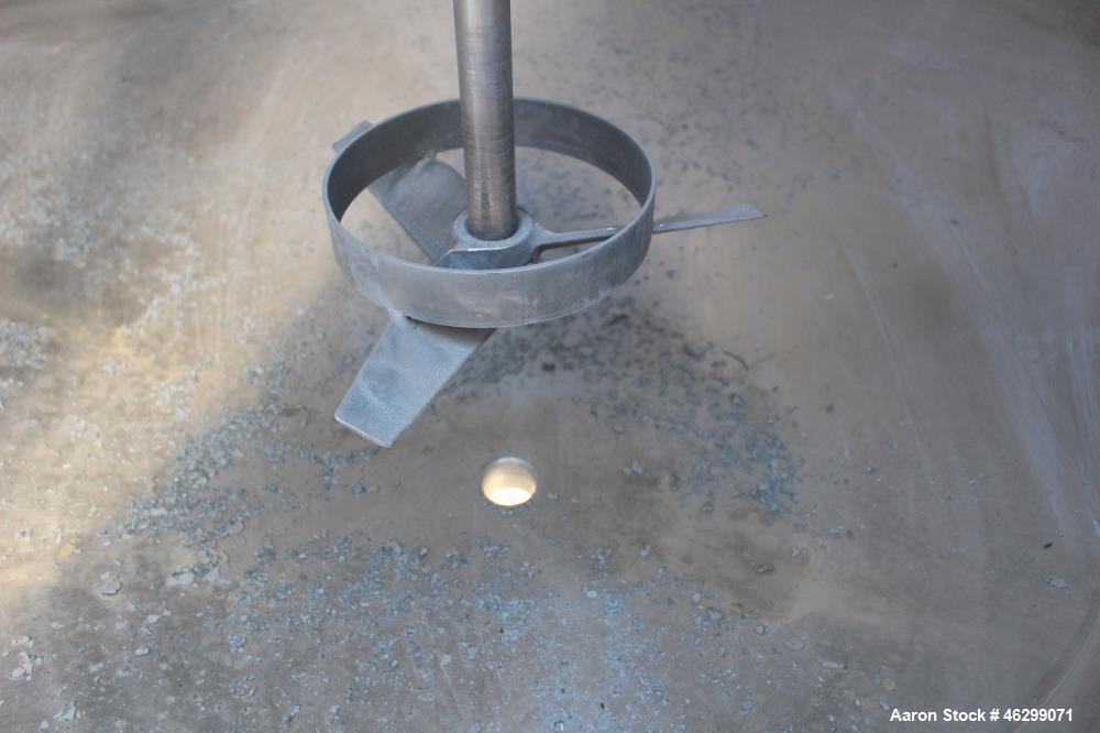 Used Tank, Approximately 350 Gallons, 304 Stainless Steel, Vertical. 60" Diameter x 28" straight side. Bolt-on flat top with 1/3 hinged cover, dished bottom. Top entering Lightnin agitator, model XJC...