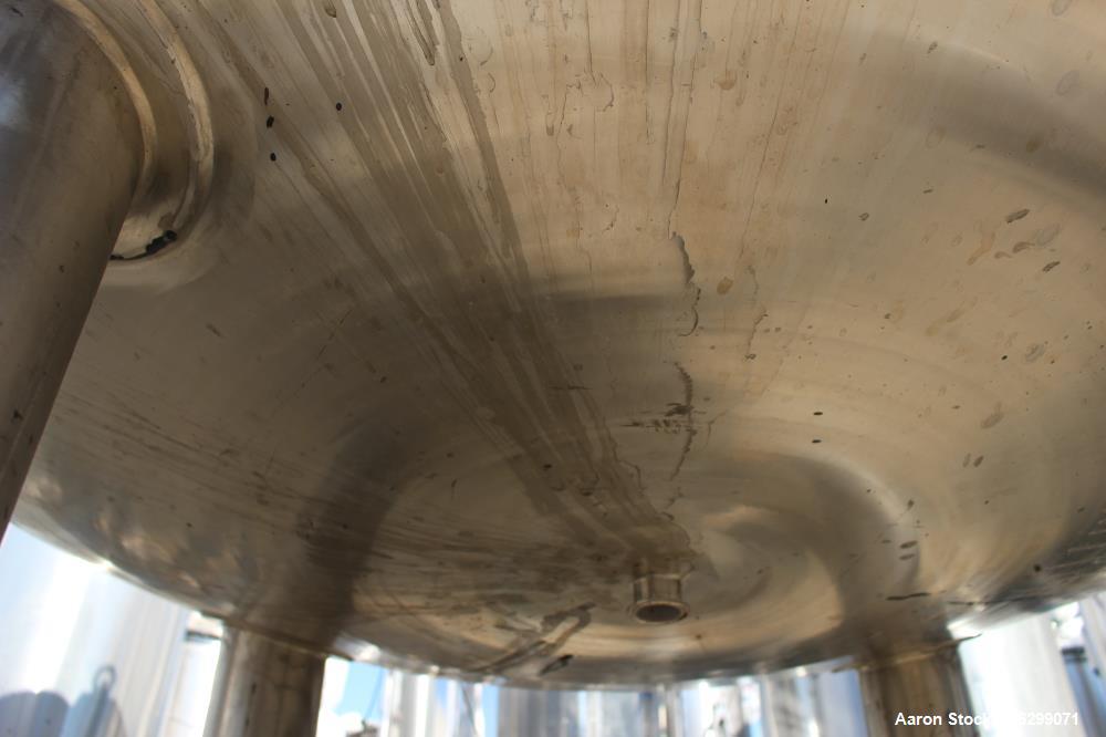 Used Tank, Approximately 350 Gallons, 304 Stainless Steel, Vertical. 60" Diameter x 28" straight side. Bolt-on flat top with 1/3 hinged cover, dished bottom. Top entering Lightnin agitator, model XJC...