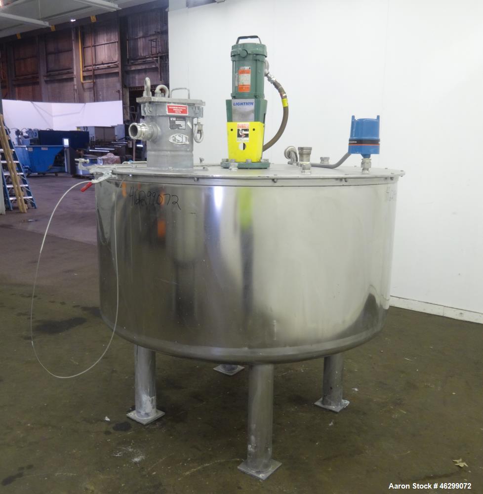Used Tank, Approximately 350 Gallons, 304 Stainless Steel, Vertical. 60" Diameter x 28" straight side. Bolt-on flat top with 1/3 hinged cover, dished bottom. Top entering Lightnin agitator, model XJC...