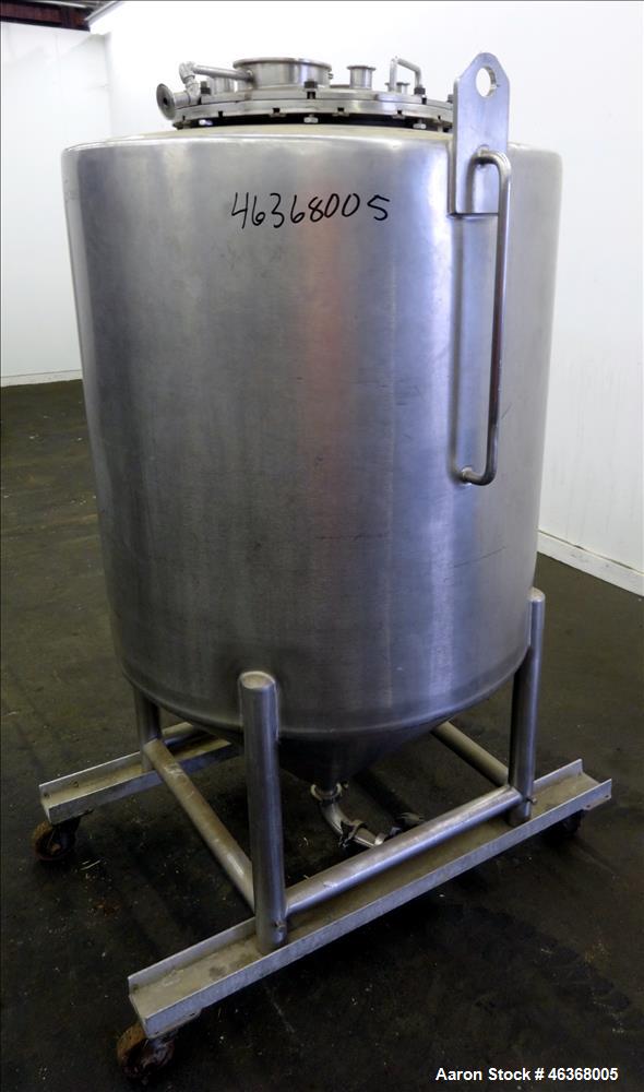 Used Tank, Approximate 200 Gallon, 304 Stainless Steel, Vertical. Approximate 35" diameter x 37" straight side. Slight dished top and 24" long coned bottom. Openings top: 18" diameter bolt on cover w...