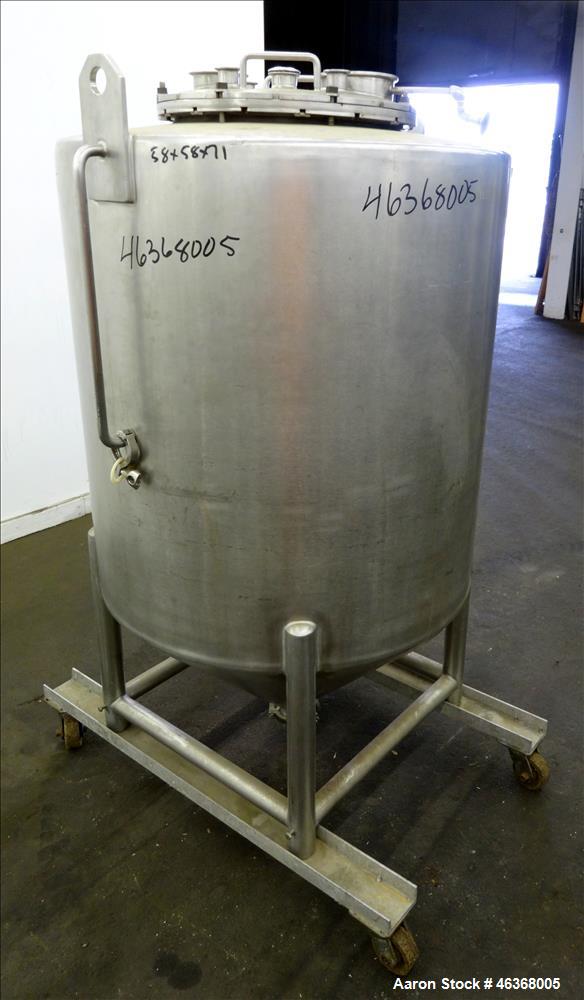 Used Tank, Approximate 200 Gallon, 304 Stainless Steel, Vertical. Approximate 35" diameter x 37" straight side. Slight dished top and 24" long coned bottom. Openings top: 18" diameter bolt on cover w...