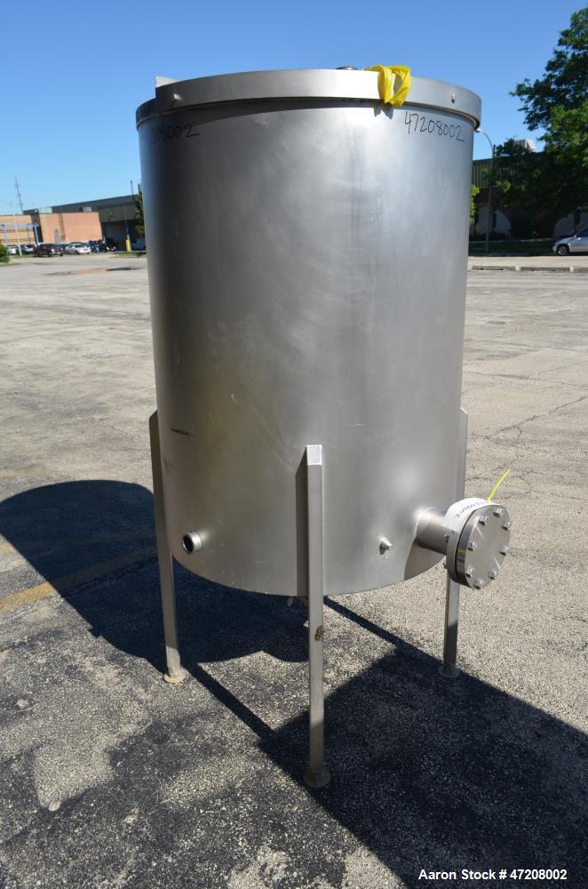 Used Tank, Approximately 200 Gallon, 304 Stainless Steel, Vertical. 36" Diameter x 48" straight side. Open top with (2) 1/2 covers, slight coned bottom. Openings side (2) 2" tri-clamp, 4". 2" Tri-cla...