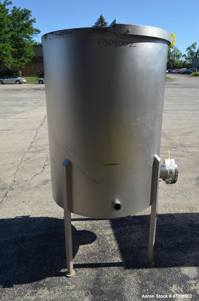 Used Tank, Approximately 200 Gallon, 304 Stainless Steel, Vertical. 36" Diameter x 48" straight side. Open top with (2) 1/2 covers, slight coned bottom. Openings side (2) 2" tri-clamp, 4". 2" Tri-cla...