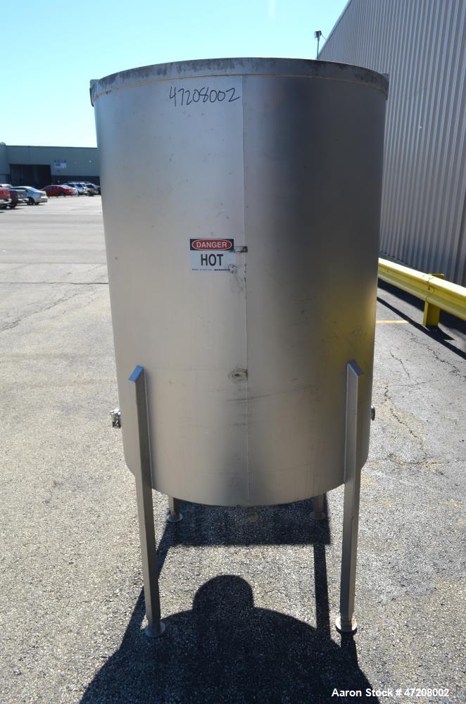 Used Tank, Approximately 200 Gallon, 304 Stainless Steel, Vertical. 36" Diameter x 48" straight side. Open top with (2) 1/2 covers, slight coned bottom. Openings side (2) 2" tri-clamp, 4". 2" Tri-cla...