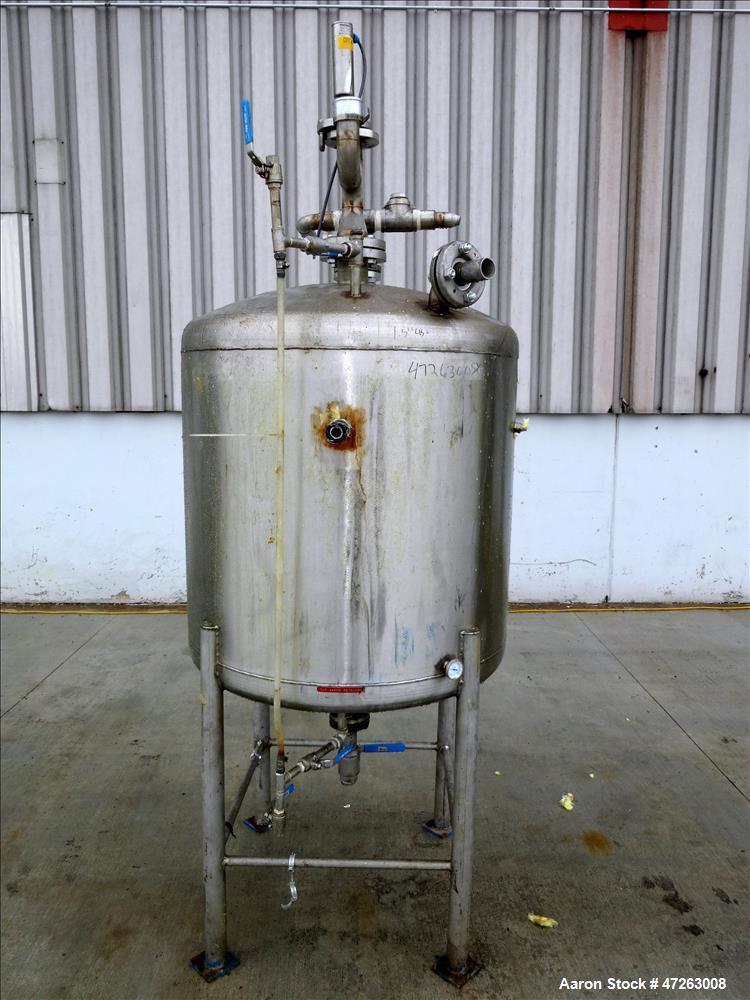 Used Tank, Approximate 150 Gallon, 304 Stainless Steel, Vertical. Approximate 38" diameter x 32" straight side, dished top and bottom. Top openings: 3", 2", 1". 1.5" Center bottom outlet. Mounted on ...