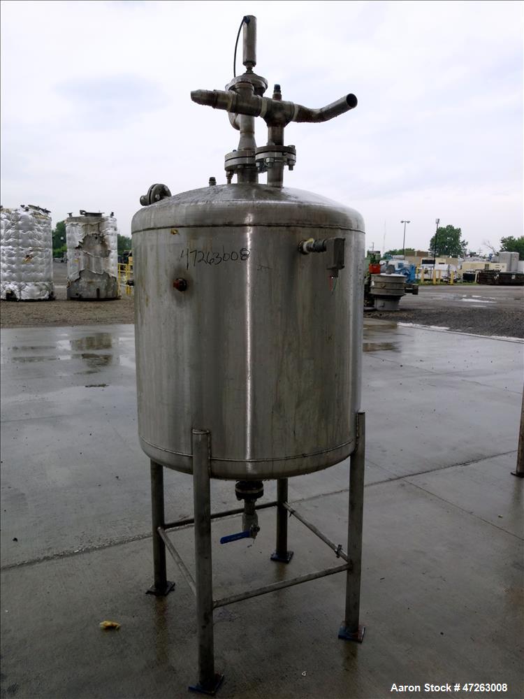Used Tank, Approximate 150 Gallon, 304 Stainless Steel, Vertical. Approximate 38" diameter x 32" straight side, dished top and bottom. Top openings: 3", 2", 1". 1.5" Center bottom outlet. Mounted on ...