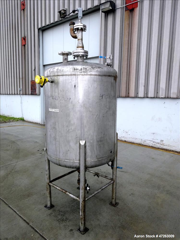 Used Tank, Approximate 120 Gallon, 304 Stainless Steel, Vertical. Approximate 30" diameter x 36" straight side, dished top and bottom. Top openings: 3", 2", 1". 1.5" Center bottom outlet. Mounted on ...