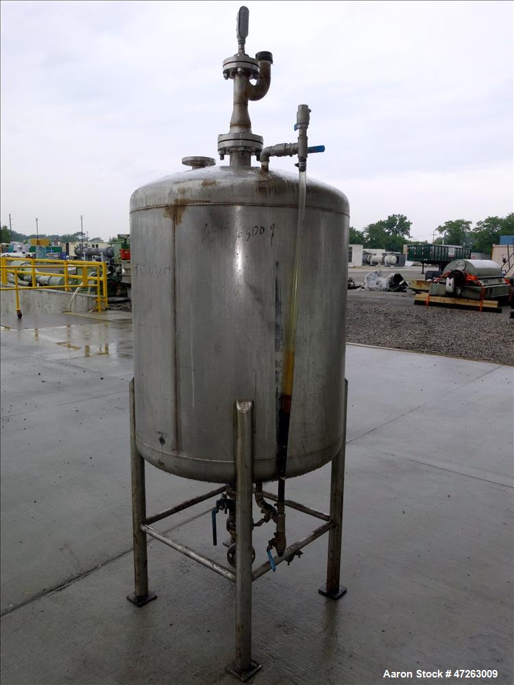 Used Tank, Approximate 120 Gallon, 304 Stainless Steel, Vertical. Approximate 30" diameter x 36" straight side, dished top and bottom. Top openings: 3", 2", 1". 1.5" Center bottom outlet. Mounted on ...