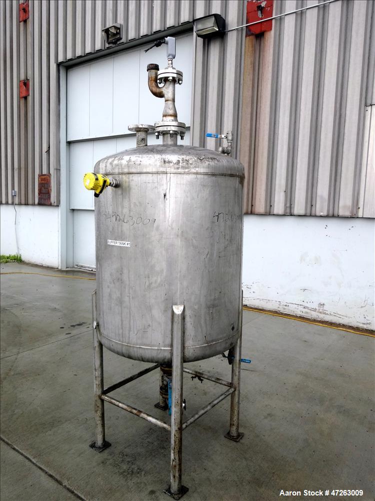 Used Tank, Approximate 120 Gallon, 304 Stainless Steel, Vertical. Approximate 30" diameter x 36" straight side, dished top and bottom. Top openings: 3", 2", 1". 1.5" Center bottom outlet. Mounted on ...