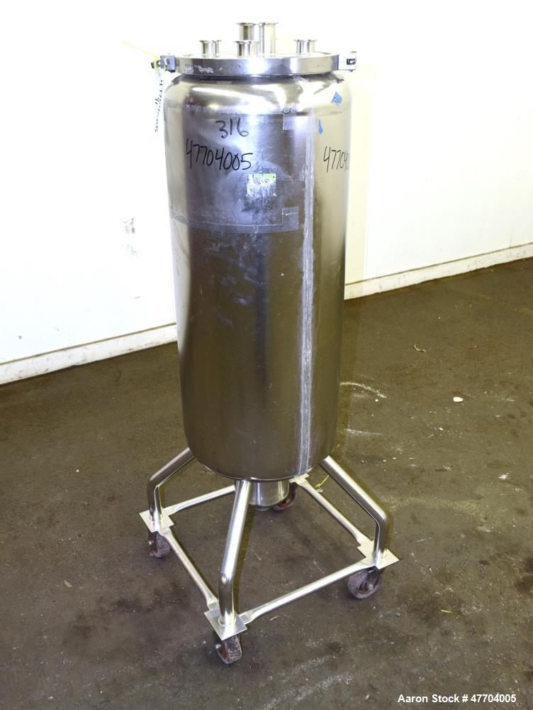 Used Tank, 30 Gallon, 316 Stainless Steel, Vertical. Approximate 16" diameter x 34" straight side, flat clamp on top, dished bottom. Openings top (4) 1-1/2" tri-clamp, 3" tri-clamp. Approximate 6" di...