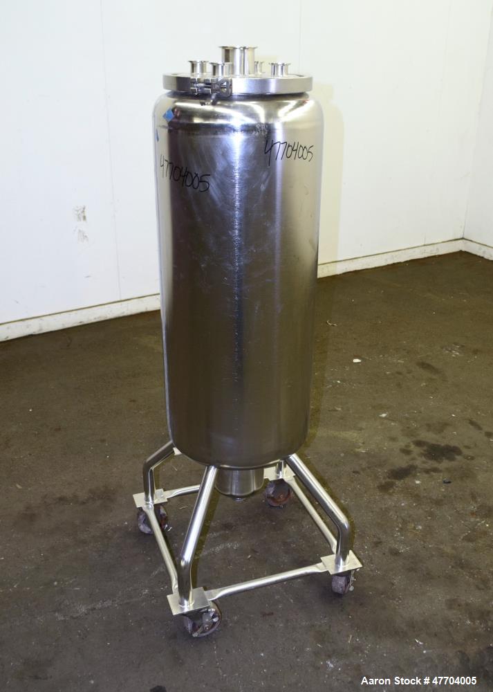 Used Tank, 30 Gallon, 316 Stainless Steel, Vertical. Approximate 16" diameter x 34" straight side, flat clamp on top, dished bottom. Openings top (4) 1-1/2" tri-clamp, 3" tri-clamp. Approximate 6" di...