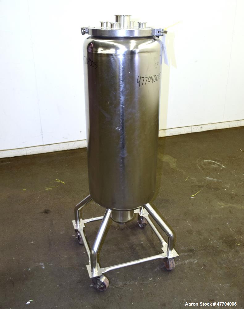 Used Tank, 30 Gallon, 316 Stainless Steel, Vertical. Approximate 16" diameter x 34" straight side, flat clamp on top, dished bottom. Openings top (4) 1-1/2" tri-clamp, 3" tri-clamp. Approximate 6" di...