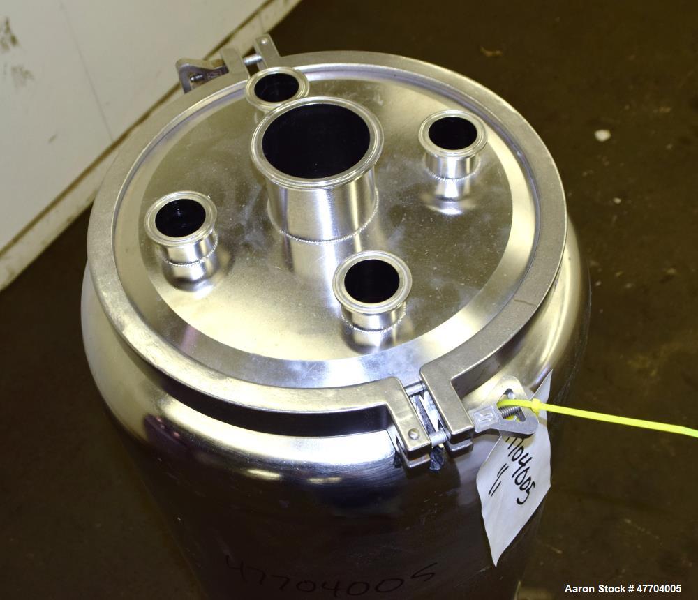 Used Tank, 30 Gallon, 316 Stainless Steel, Vertical. Approximate 16" diameter x 34" straight side, flat clamp on top, dished bottom. Openings top (4) 1-1/2" tri-clamp, 3" tri-clamp. Approximate 6" di...