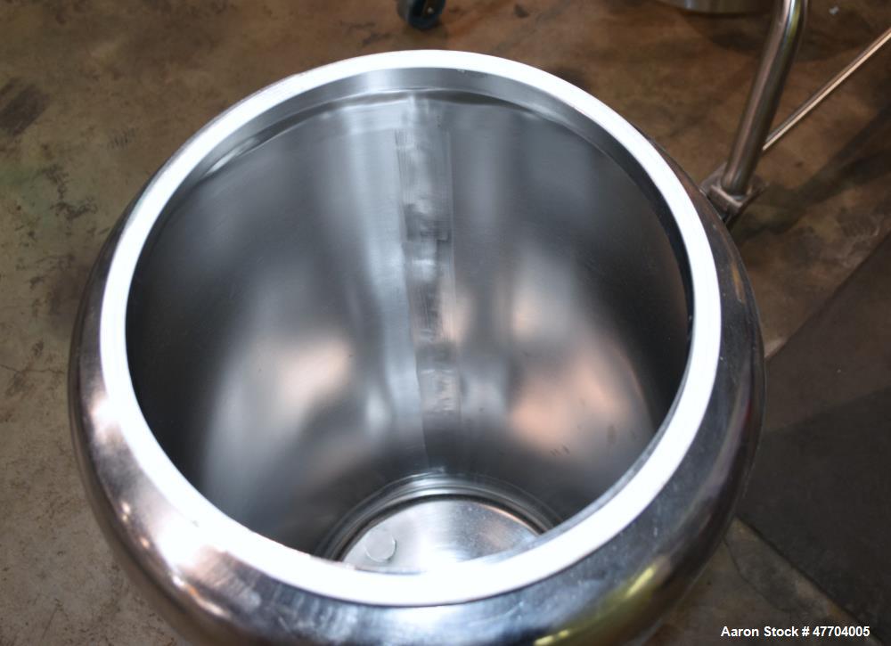 Used Tank, 30 Gallon, 316 Stainless Steel, Vertical. Approximate 16" diameter x 34" straight side, flat clamp on top, dished bottom. Openings top (4) 1-1/2" tri-clamp, 3" tri-clamp. Approximate 6" di...