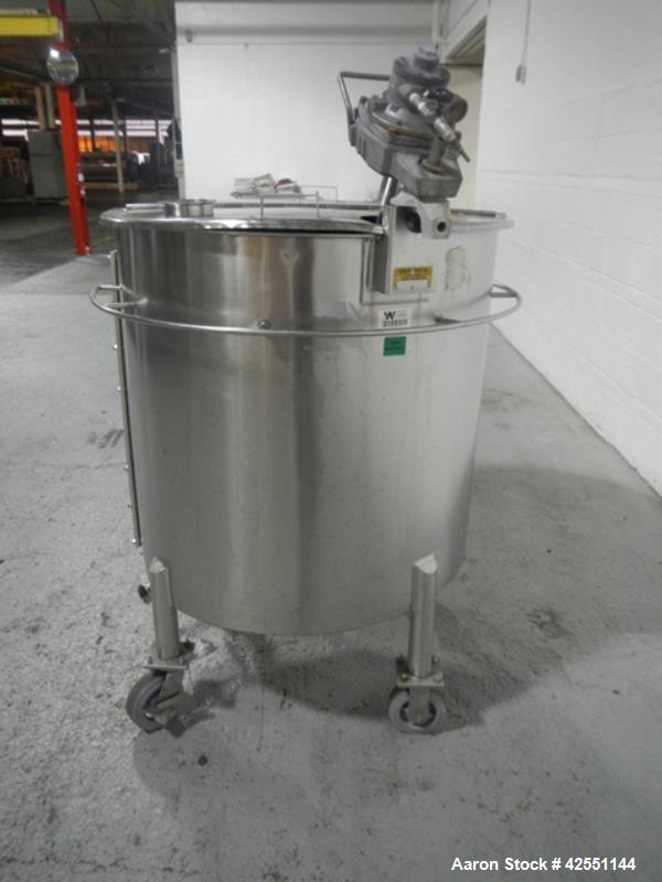 Used Lee tank, 130 gallon, model 500LDBT, stainless steel construction, approximately 36" diameter x 36" straight side, open top, flat slopping bottom, 2" center bottom outlet with clamp on Chemineer...