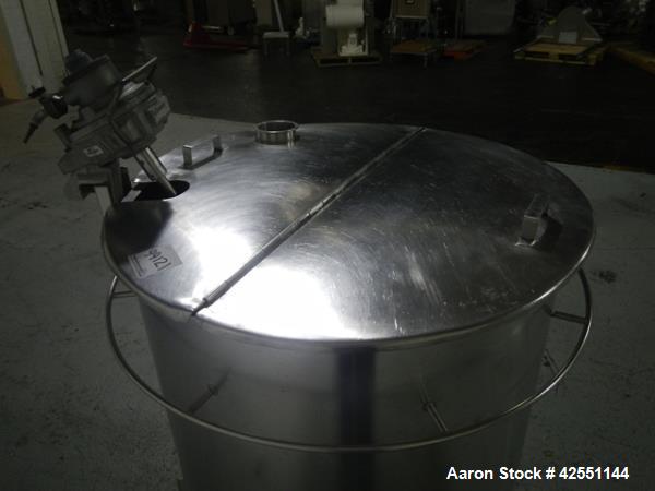Used Lee tank, 130 gallon, model 500LDBT, stainless steel construction, approximately 36" diameter x 36" straight side, open top, flat slopping bottom, 2" center bottom outlet with clamp on Chemineer...
