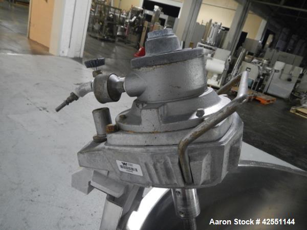 Used Lee tank, 130 gallon, model 500LDBT, stainless steel construction, approximately 36" diameter x 36" straight side, open top, flat slopping bottom, 2" center bottom outlet with clamp on Chemineer...
