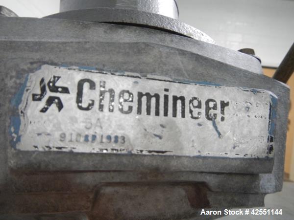 Used Lee tank, 130 gallon, model 500LDBT, stainless steel construction, approximately 36" diameter x 36" straight side, open top, flat slopping bottom, 2" center bottom outlet with clamp on Chemineer...