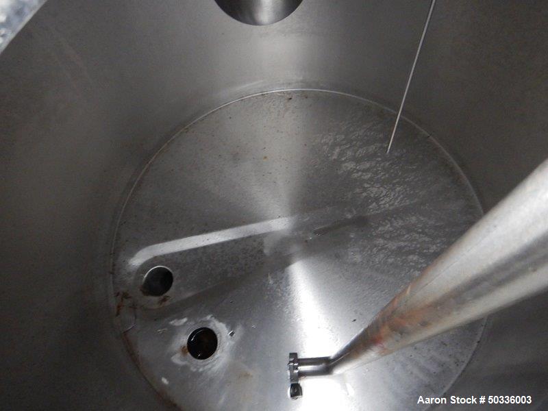 Used Tank, Approximately 175 Gallon, Stainless Steel, Vertical. Approximate 34" diameter x 36" straight side.  Flat top with hinged 1/3 cover, flat bottom. Includes CIP spray ball. Bottom outlet. Mou...