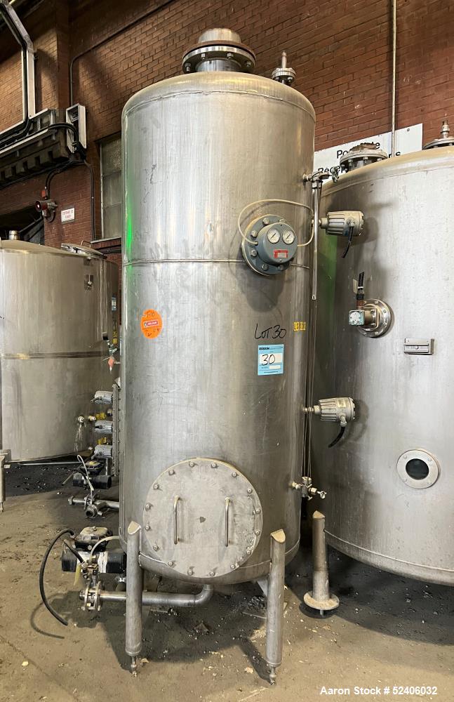 Used Tank, Approximate 250 Gallon, Stainless Steel, Vertical. Approximate 30" diameter x 77" straight side, dished top & bottom. Mounted on 4 stainless legs.