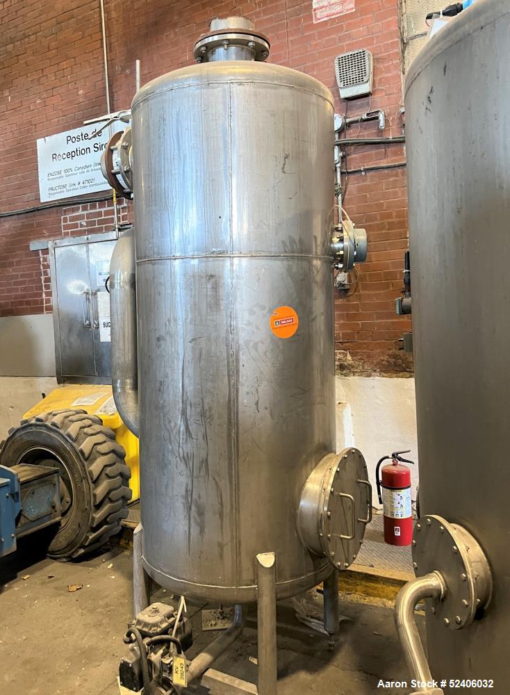 Used Tank, Approximate 250 Gallon, Stainless Steel, Vertical. Approximate 30" diameter x 77" straight side, dished top & bottom. Mounted on 4 stainless legs.