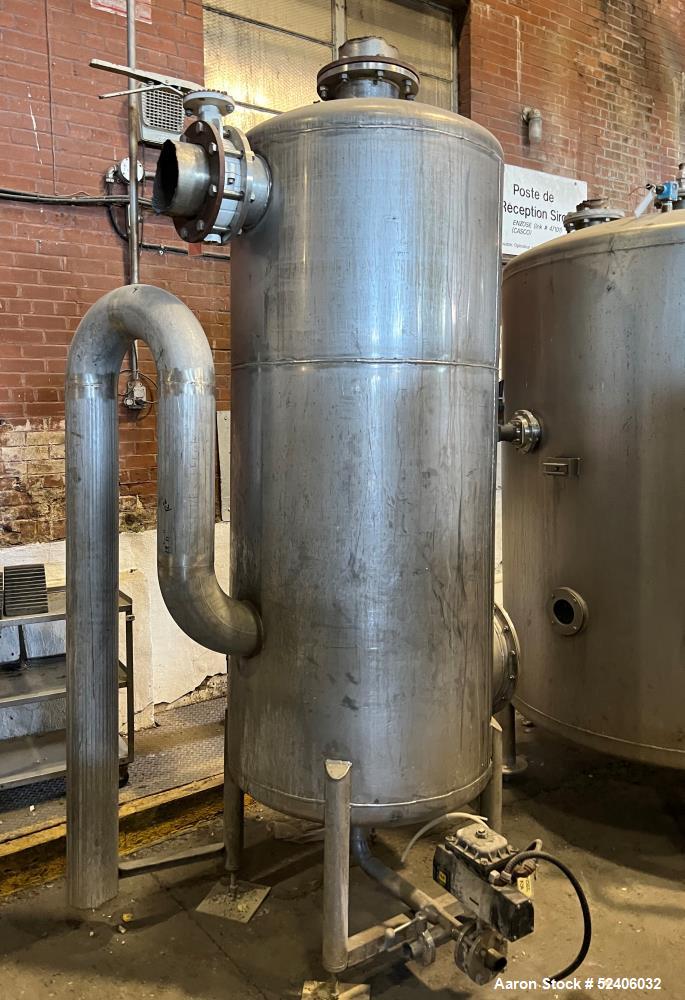 Used Tank, Approximate 250 Gallon, Stainless Steel, Vertical. Approximate 30" diameter x 77" straight side, dished top & bottom. Mounted on 4 stainless legs.
