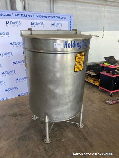 Used- Stainless Steel Tank, Approximate 100 Gallon, Stainless Steel, Vertical. Flat top, pitched bottom. Bottom outlet. Moun...