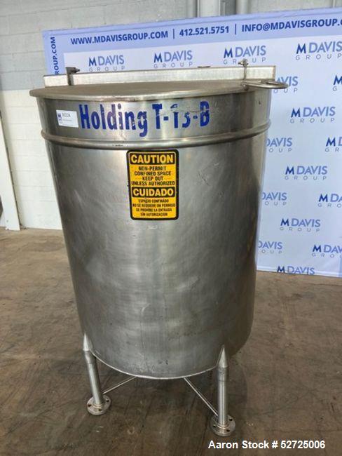 Used- Stainless Steel Tank, Approximate 100 Gallon, Stainless Steel, Vertical. Flat top, pitched bottom. Bottom outlet. Moun...