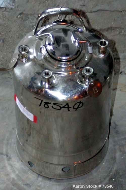 Used Pressure Tank, 4.40 Gallon, T316L Stainless Steel. 12" diameter x 9" straight side. Rated 140 PSI @ 100 Degrees F. Openings top: (3) 1/4", (1) 1/2", (1) 4" x 3" oval opening with cover.
