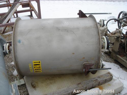USED: Tank, 125 gallon, stainless steel, vertical. 30" diameter x 38" straight side, dish top and bottom. Openings: top 1", 2", 4"; 2" center bottom outlet. 3 carbon steel side lug mounts.