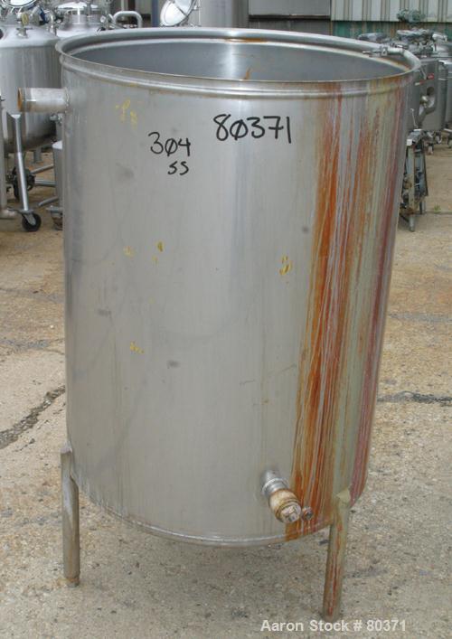 USED: Tank, 200 gallon, 304 stainless steel, vertical. 36" diameter x46" straight side. Open top with cover, 1" sloped bottom. Openings:side (3) 2-1/4" NPT; 3-1/2" end bottom outlet. Mounted on 3 sta...