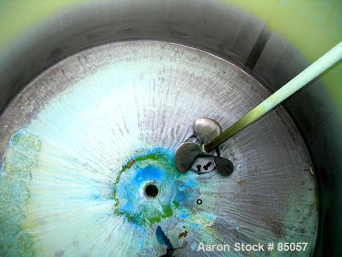 USED: Mix tank, 525 gallon, 304 stainless steel, vertical. 54" diameter x 51" straight side. Flat top, slight coned bottom. Off center Lightnin top mounted agitator, model N33G-75. 1-1/2" diameter ca...