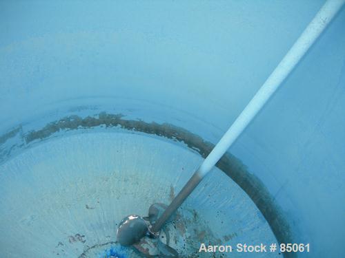 USED: Mix tank, 525 gallon, 304 stainless steel, vertical. 54" diameter x 51" straight side. Flat top, slight coned bottom. Off center Lightnin top mounted agitator, model N33G-75. 1-1/2" diameter ca...